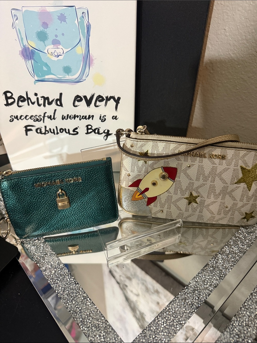 Michael Kors Gold Monogram Wristlet with Rocket Patch and Gold Stars